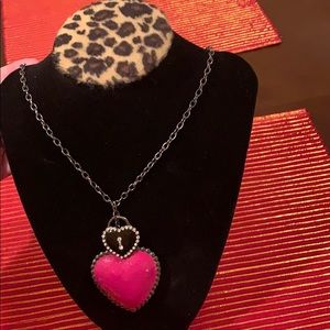 Pink and black heart necklace.